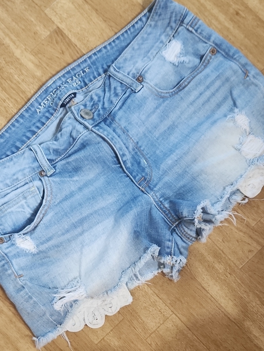 American Eagle Outfitters Light Blue Distressed Denim Shorts with Lace Hem